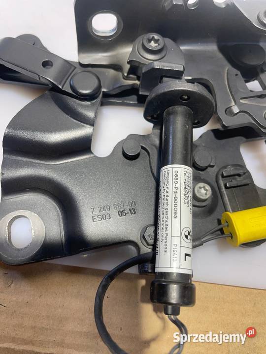 BMW F10 F11 ZAWIAS MASKI LEWY NABÓJ ORYGINAŁ B90 osobowe