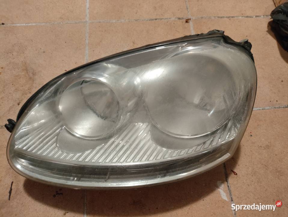 Reflektor VW Jetta III Golf V lewy orginalny Warszawa