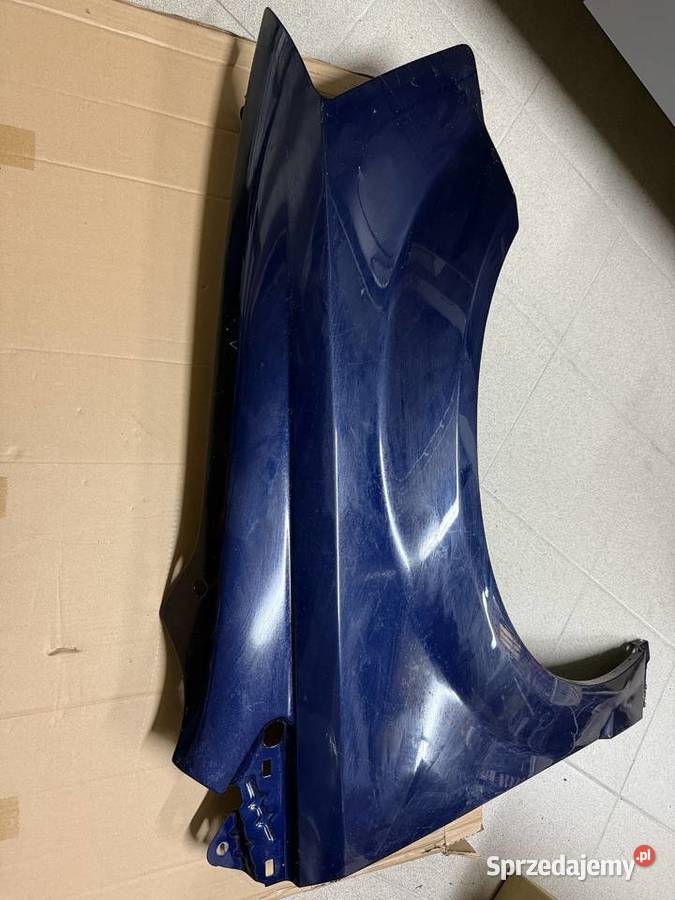 Błotnik prawy przód Dodge Grand Caravan oryginał Błotniki Kolbuszowa Dolna