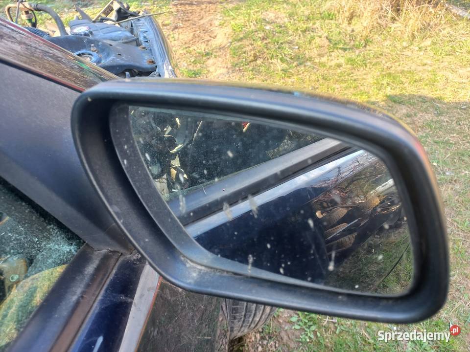 Lampa prawa lewa tył zderzak tył drzwi prawy tył osobowe Iwanowice Dworskie