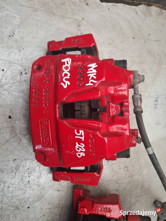 FORD FOCUS MK4 ST 23 zacisk jarzmo przód prawe