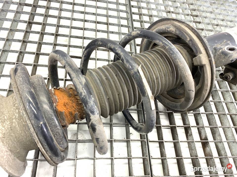 AMORTYZATOR LEWY PRZÓD ZE SPRĘŻYNĄ BMW E83 20