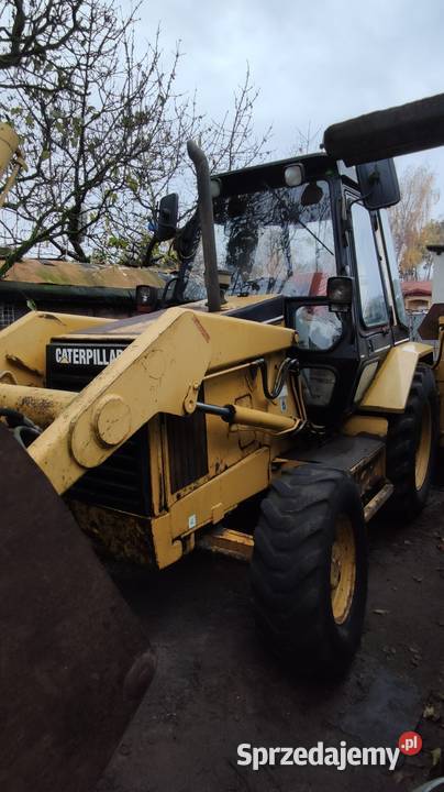 Koparko ładowarka CAT428B Łódź
