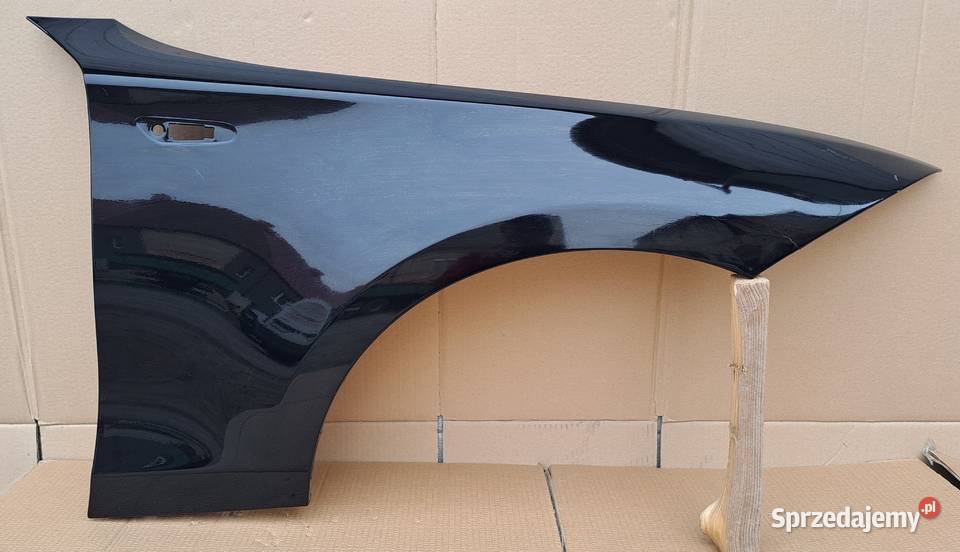 Błotnik prawy przód BMW E81 E82 E87 E88 kolor