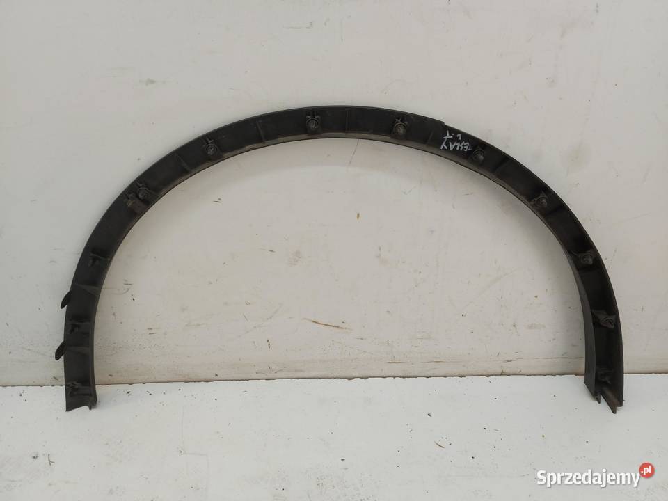 TESLA MODEL Y 2024r LISTWA BŁOTNIKA LEWY TYŁ