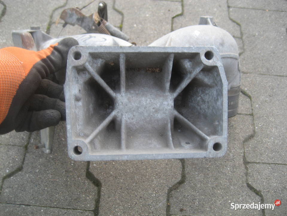 MERCEDES 202 36B KOLEKTOR SSĄCY 1041414801 osobowe Silniki i osprzęt