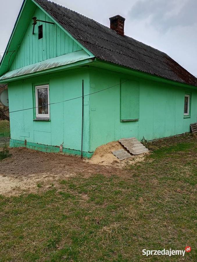 Sprzedam dom drewniany z zabudowaniami