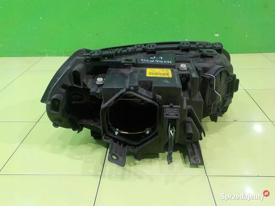 BMW X3 E83 25 B AUT 06r lampa lewa przod osobowe Suków