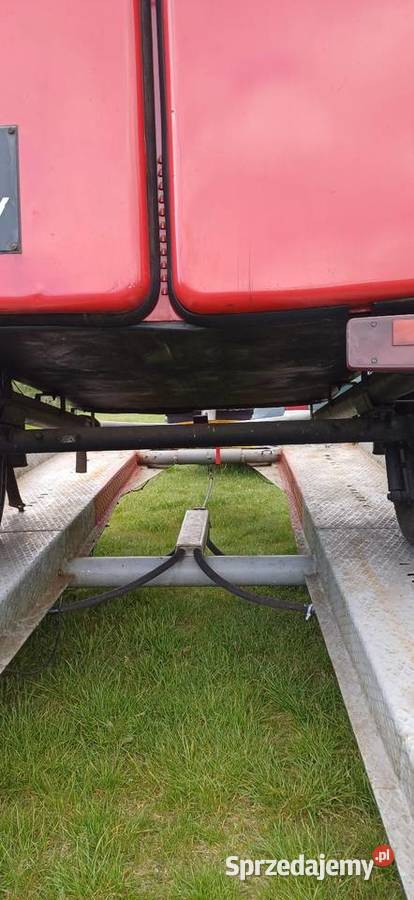 Transport pojazdow osobowych laweta pomoc Wołów