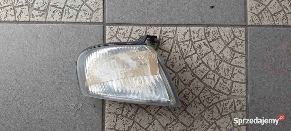 Kia sephia I 1998 KIERUNKOWSKAZ LEWY osobowe Byków