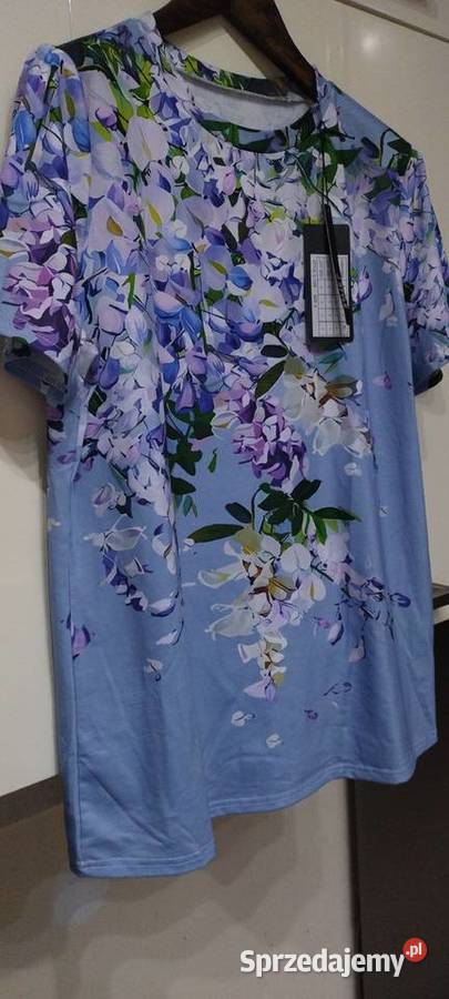 Bluzka z krótkimi rękawami na niebieskim tle Bluzki i koszule Lublin