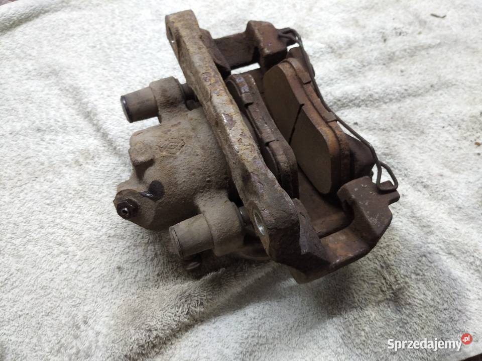 Laguna III zacisk hamulca prawy przód wielkopolskie Swarzędz