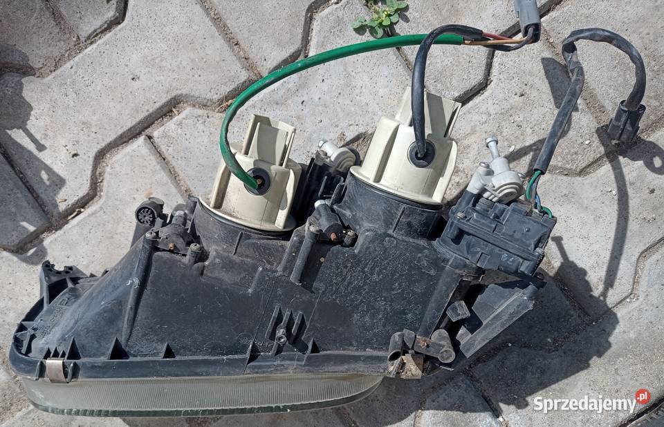 Lampa reflektor lewy przedni manualna Mazda Marcinkowice sprzedam