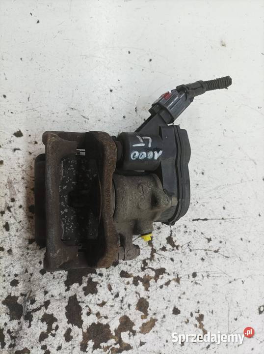 ZACISK HAMULCOWY LEWY TYŁ 17 DCI 440102238R