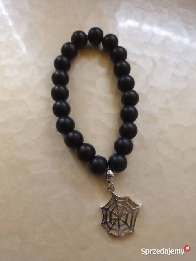 Bransoletka z koralików onyksowych z zawieszką