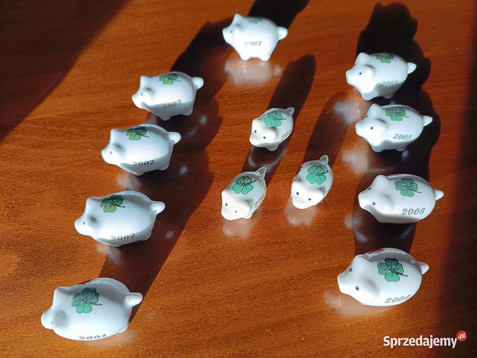 Zbiór 12 figurek świnek z nadrukiem roku VINTAGE Szczyrk