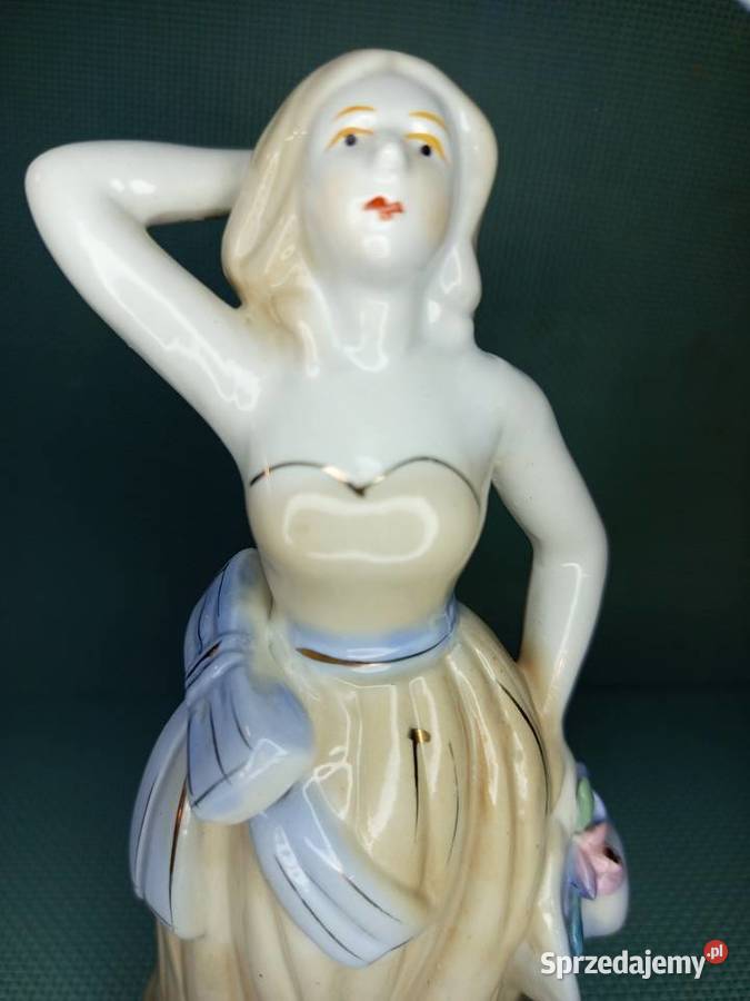 Porcelanowa figurka eleganckiej damy z Warszawa