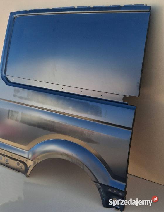 VW CRAFTER II 7C MAN TGE BŁOTNIK PRAWY TYŁ Bieleń