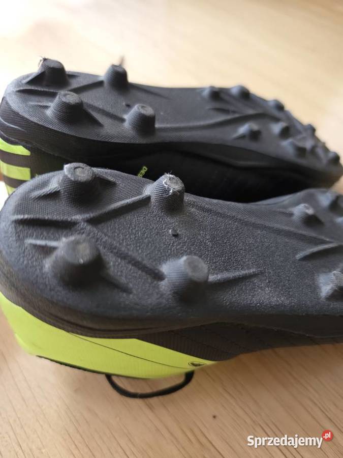 Buty piłkarskie korki Kipsta 100 czarnoneonowe skóra ekologiczna