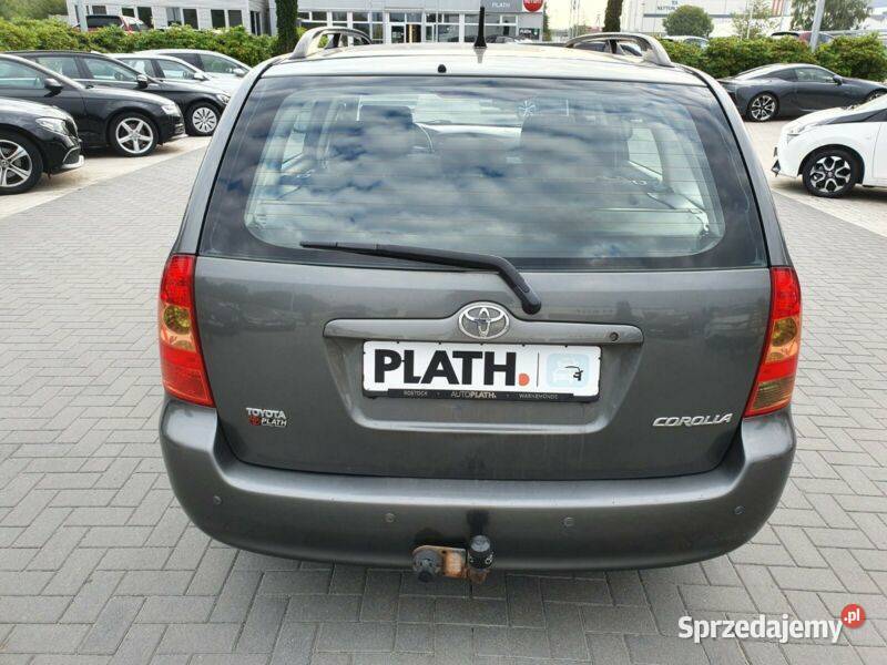 COROLLA E12 drzwi prawy tył czerwoną bez