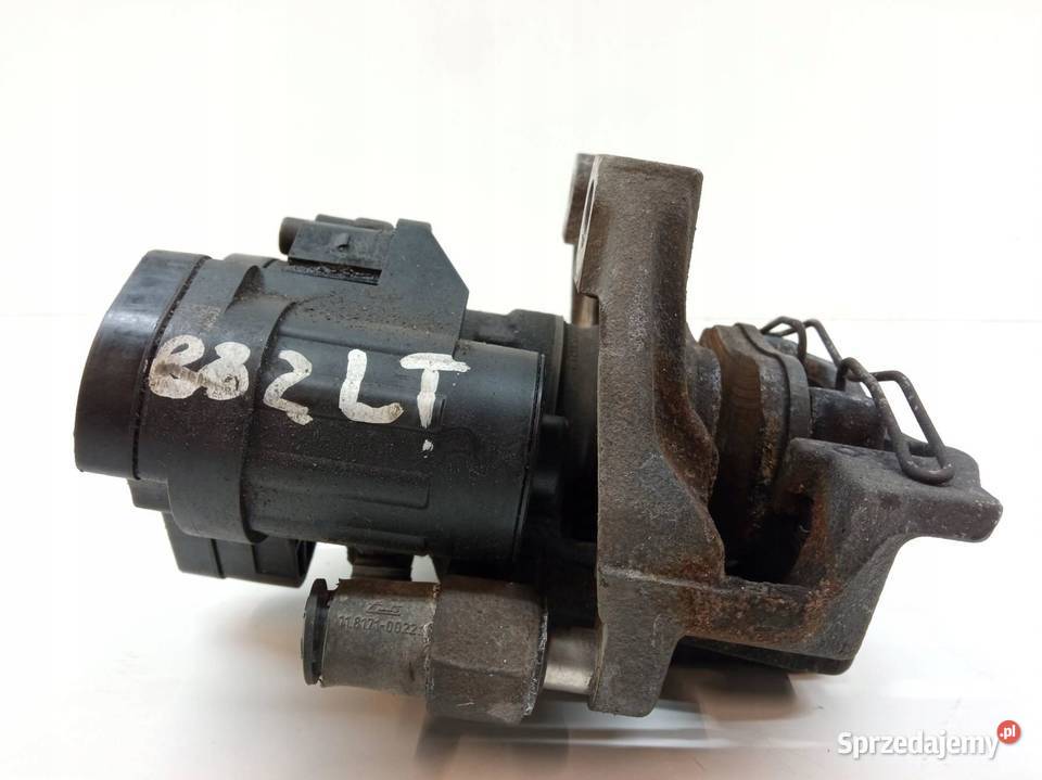 ZACISK HAMULCOWY LEWY TYŁ 5R3615405A Skoda
