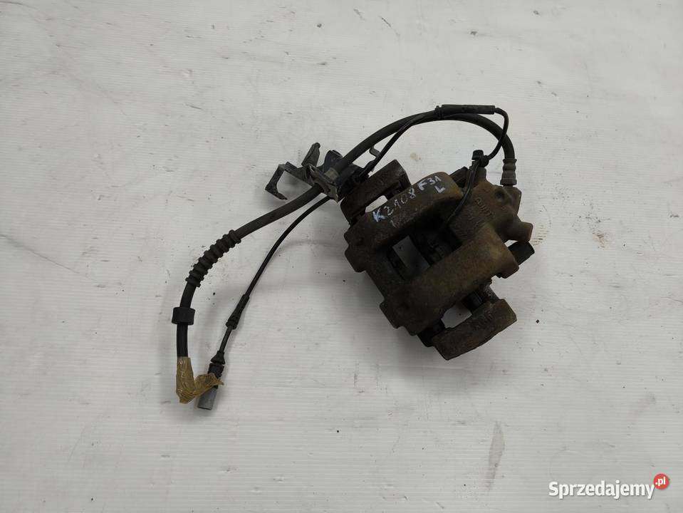 ZACISK LEWY PRZÓD BMW F31 20D LIFT osobowe wielkopolskie