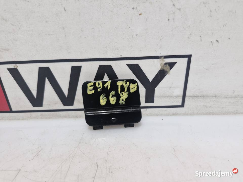 7202672 BWM E91 ZAŚLEPKA HAKA ZDERZAKA TYŁ 668 Listwy i nakładki sprzedam
