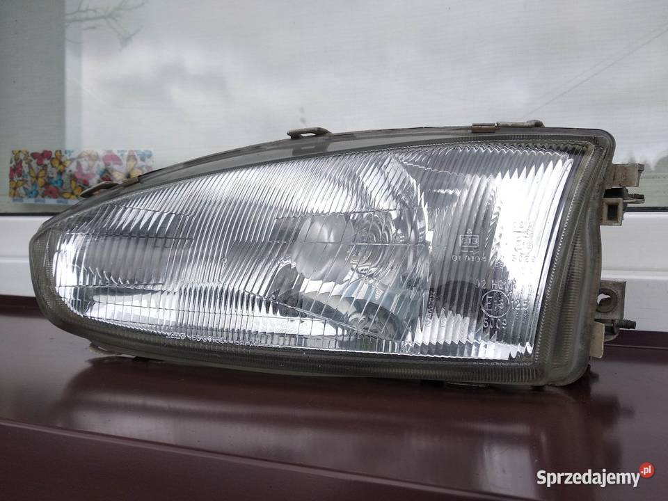 Mitsubishi Colt V CJ0 lampa przednia lewa Sieradz