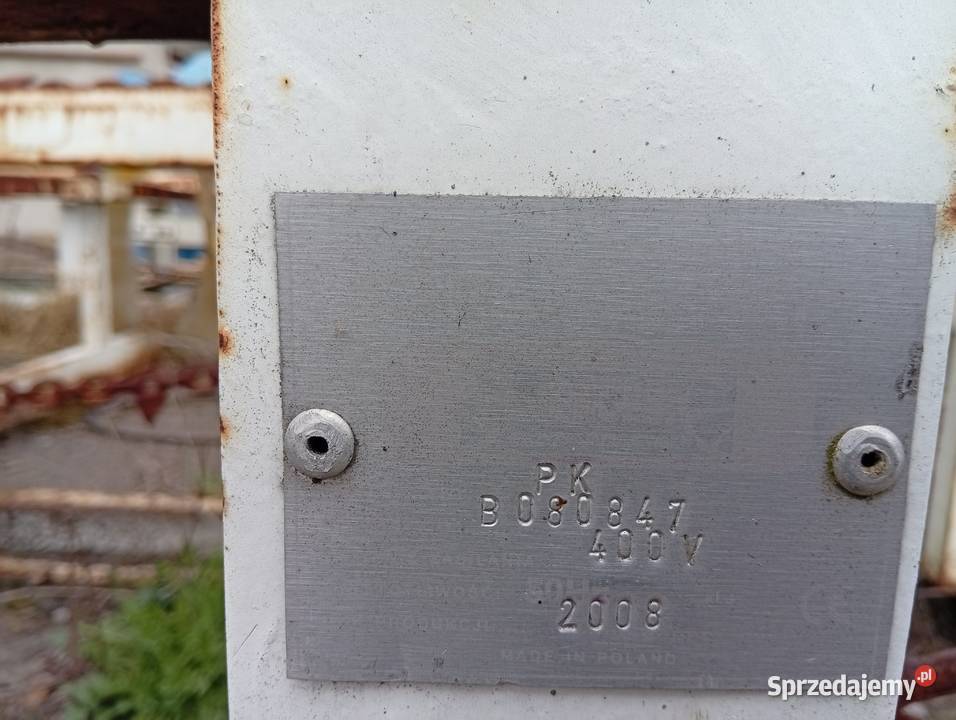 Podajnik kłódzasobnik łańcuchowy do traka firmy