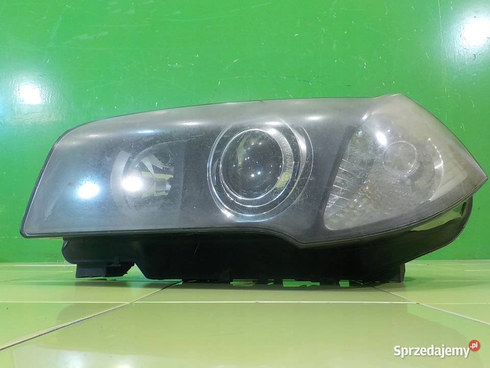 BMW X3 E83 30 B 04r 5D lampa lewa przod XENON Suków