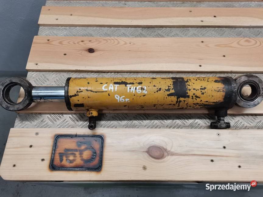 Siłownik poziomowania CAT TH 62 1996r do 1998r Pozostałe wielkopolskie