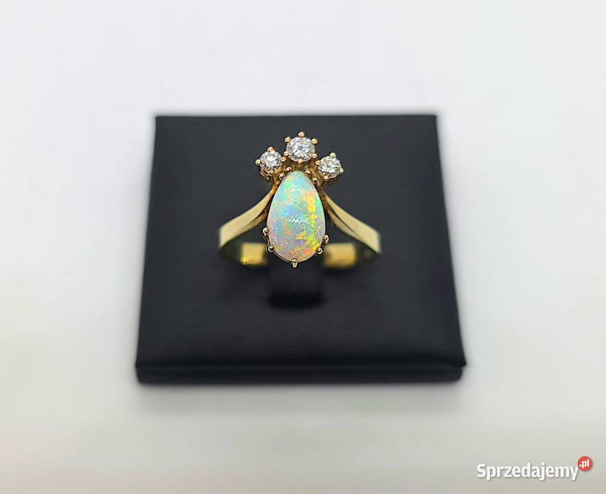 Złoty pierścionek z diamentami i opalem próby Elbląg
