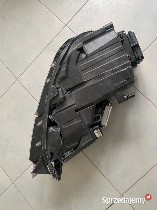LAMPA LEWA PRZÓD VW TOUREG II 7P USZKODZONA Grzebowilk