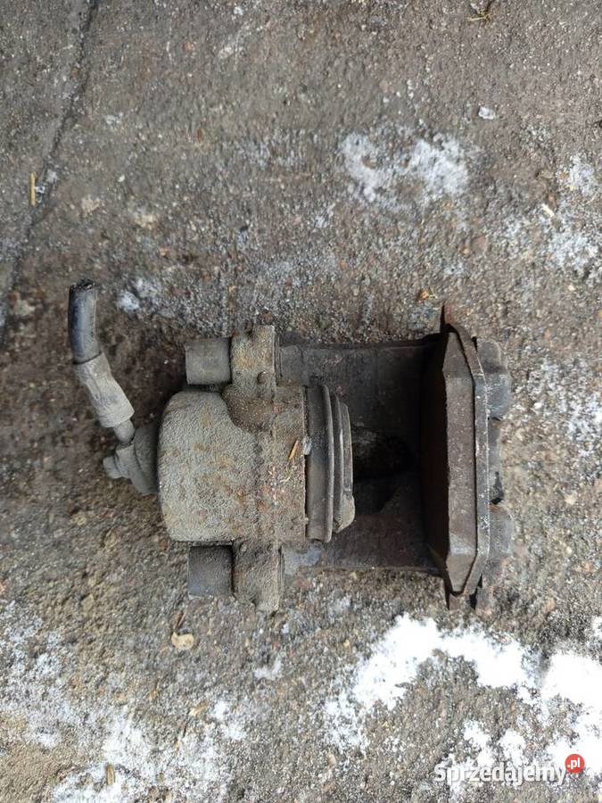 Zacisk hamulca prawy przód Skoda Fabia 1