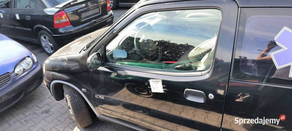 DRZWI LEWE PRZÓD SUZUKI IGNIS 2001 Lipno