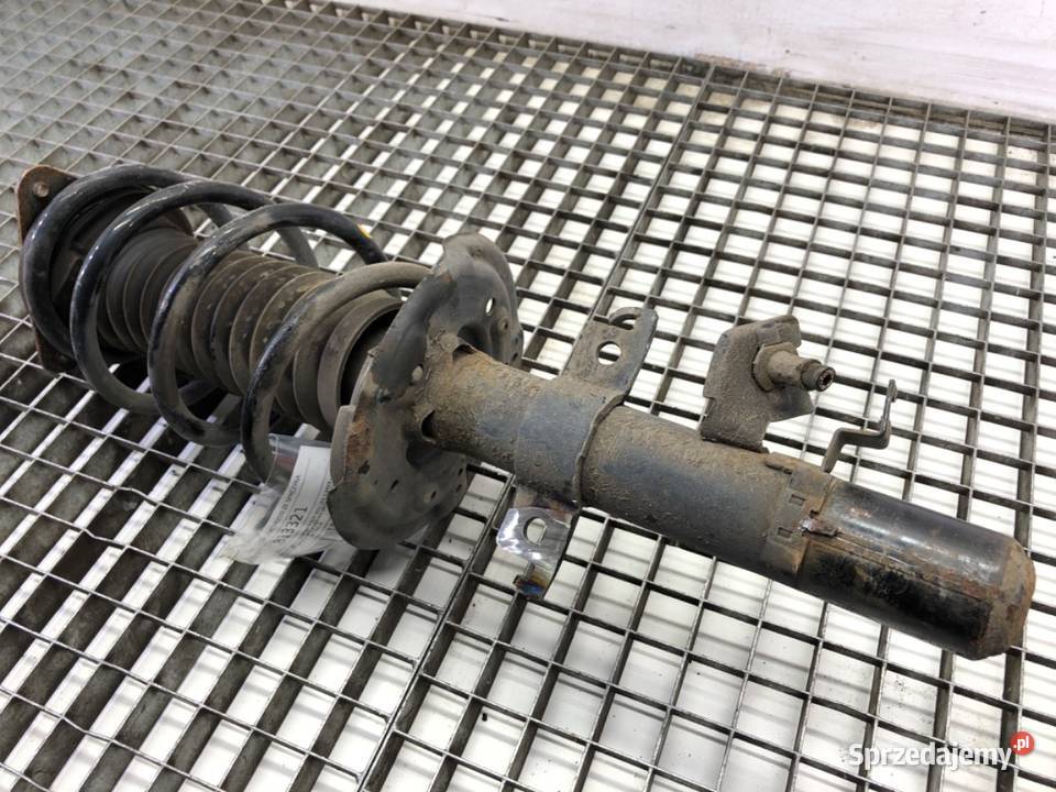 AMORTYZATOR LEWY PRZÓD ZE SPRĘŻYNĄ NISSAN