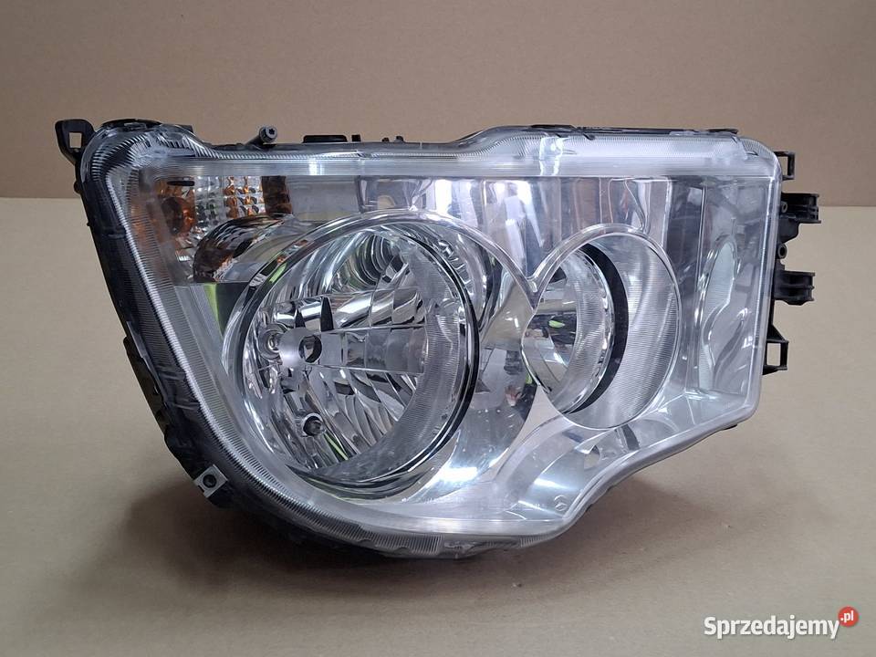 MERCEDES ANTOS AROCS REFLEKTOR PRAWY ORYGINAŁ Bieleń