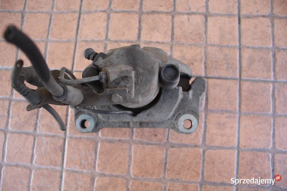 ZACISK HAMULCOWY PRAWY PRZÓD AUDI A6 C5 19 TDI