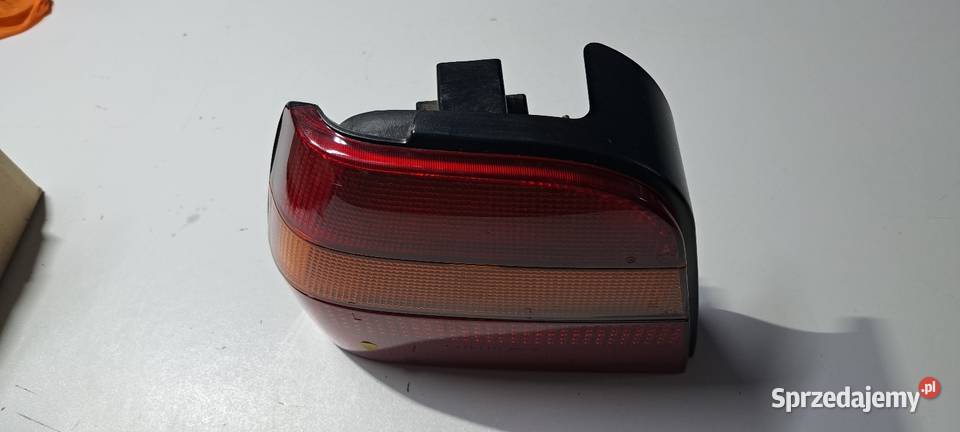 Nowa oryginalna lampa lewa tył VW Polo 86c 2F Luzino