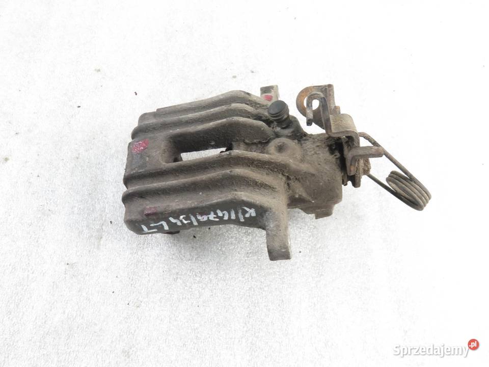 ZACISK LEWY TYŁ AUDI A4 B5 19 TDI Zaciski i jarzma