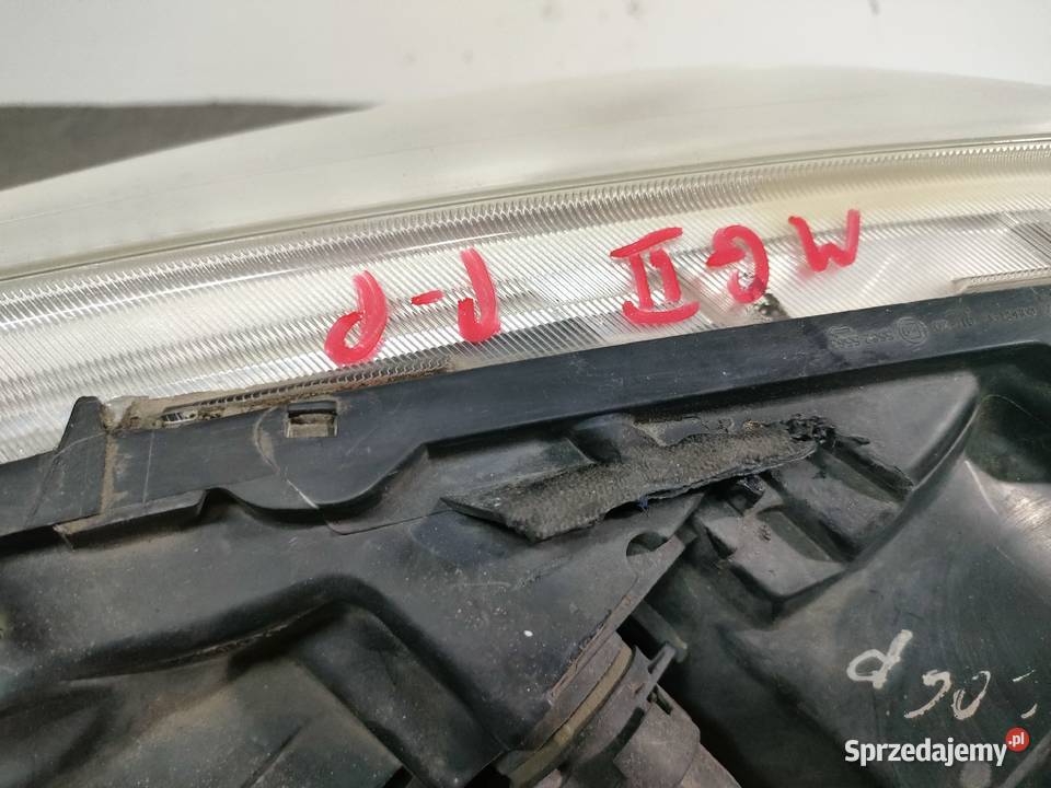 Megane II lift prawa lampa przód EUROPA Swarzędz sprzedam