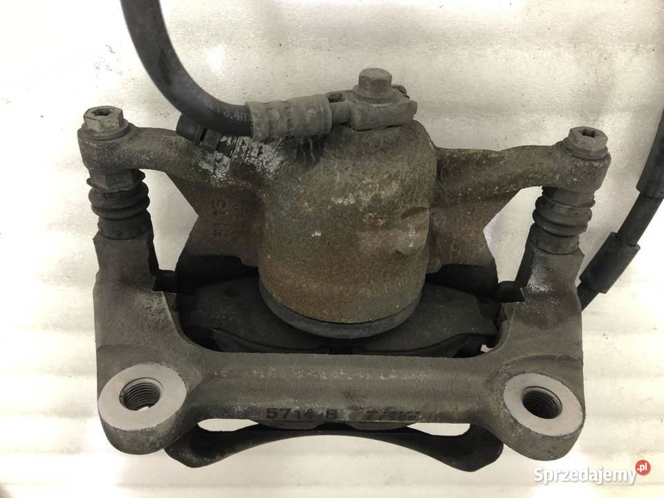 ZACISK LEWY PRZÓD VOLKSWAGEN TOURAN III osobowe Zaciski i jarzma