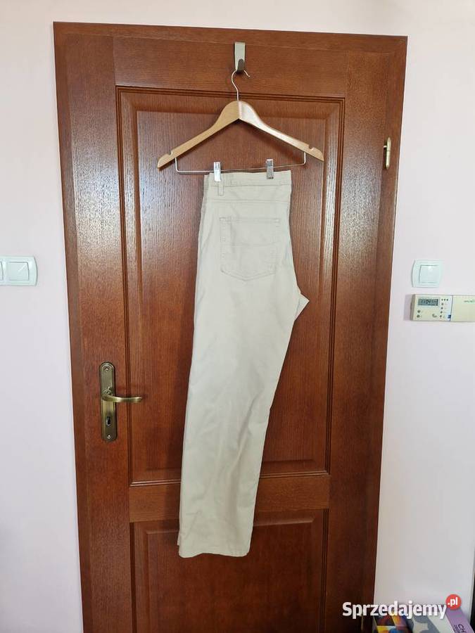 Spodnie beżowe bawełniane męskie chinosy Marks