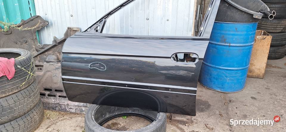 Drzwi BMW E38 lewy przod Cosmoschwartz ZDROWE Piła