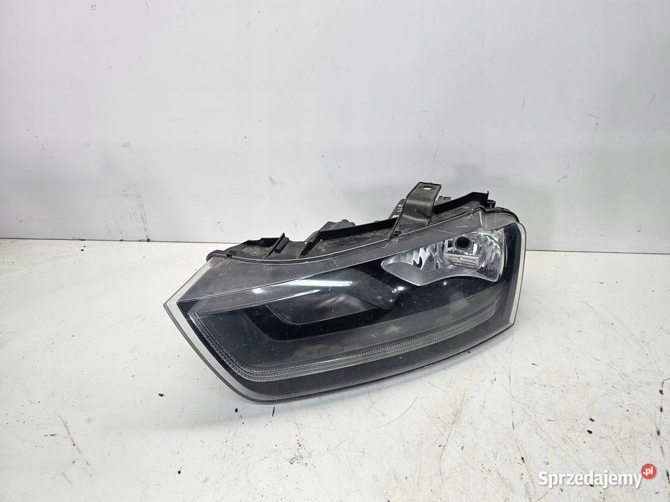 REFLEKTOR LEWY ZWYKŁY AUDI Q3 8U 8U0941003N Oświetlenie Przystajń