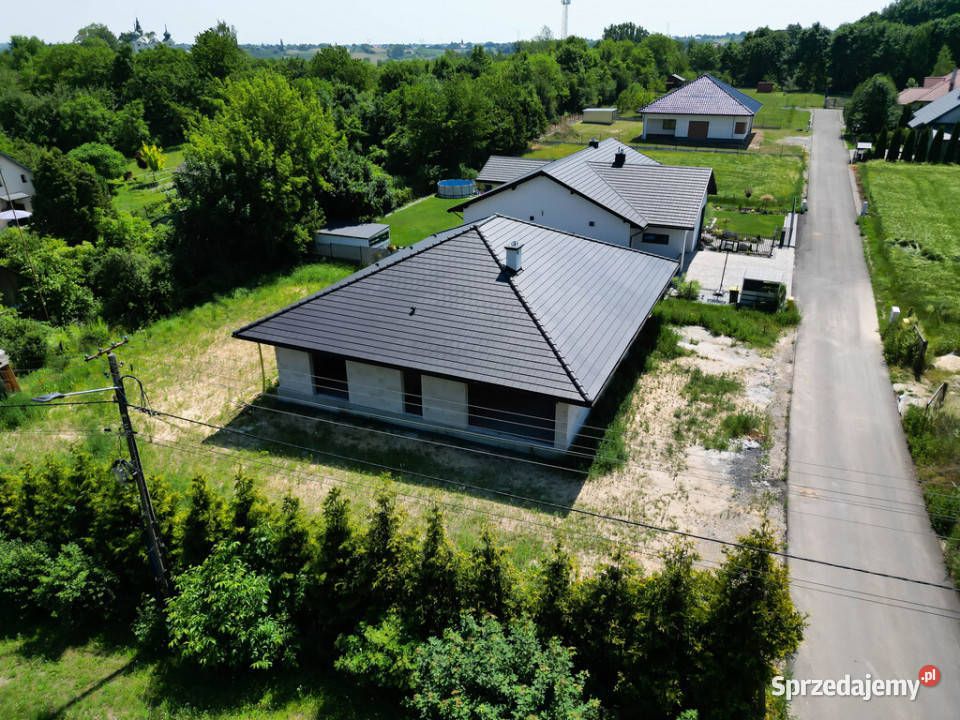 Dom parterowy stan surowy130m21121m2 Szewna