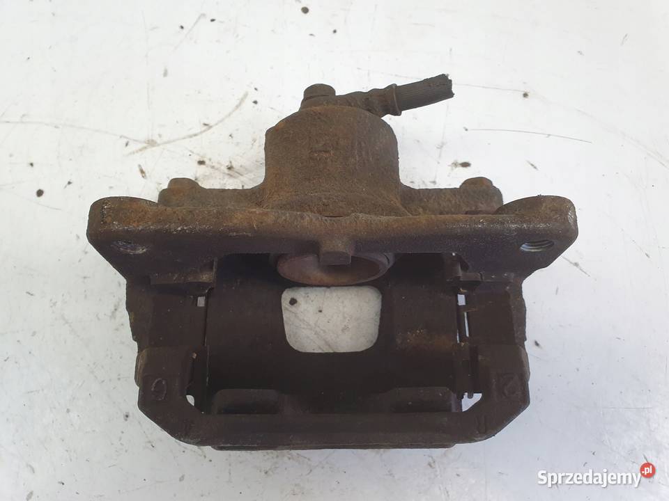 Toyota IQ PRAWY PRZEDNI ZACISK HAMULCOWY przód Rudka