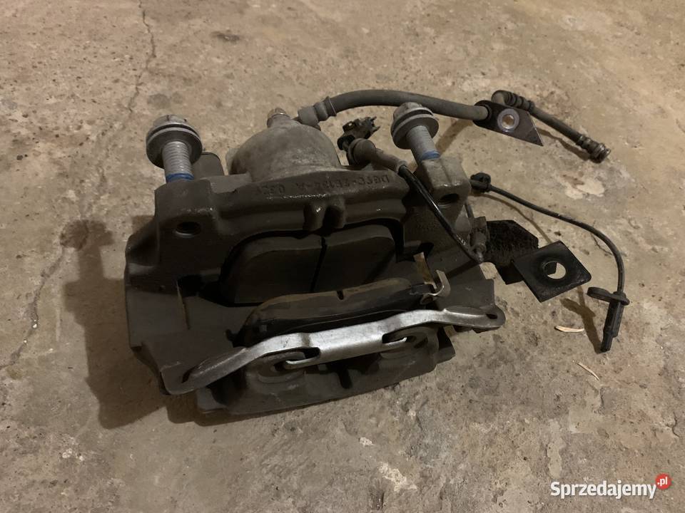 Zacisk prawy przód Ford Fusion Mondeo mk5 mkV osobowe Warszawa