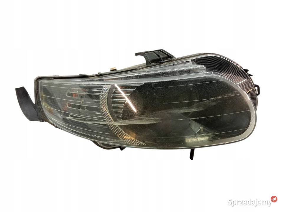 LAMPA PRZÓD PRAWA SOCZEWKA H7 EU USZKODZONA Saab Lampy przednie