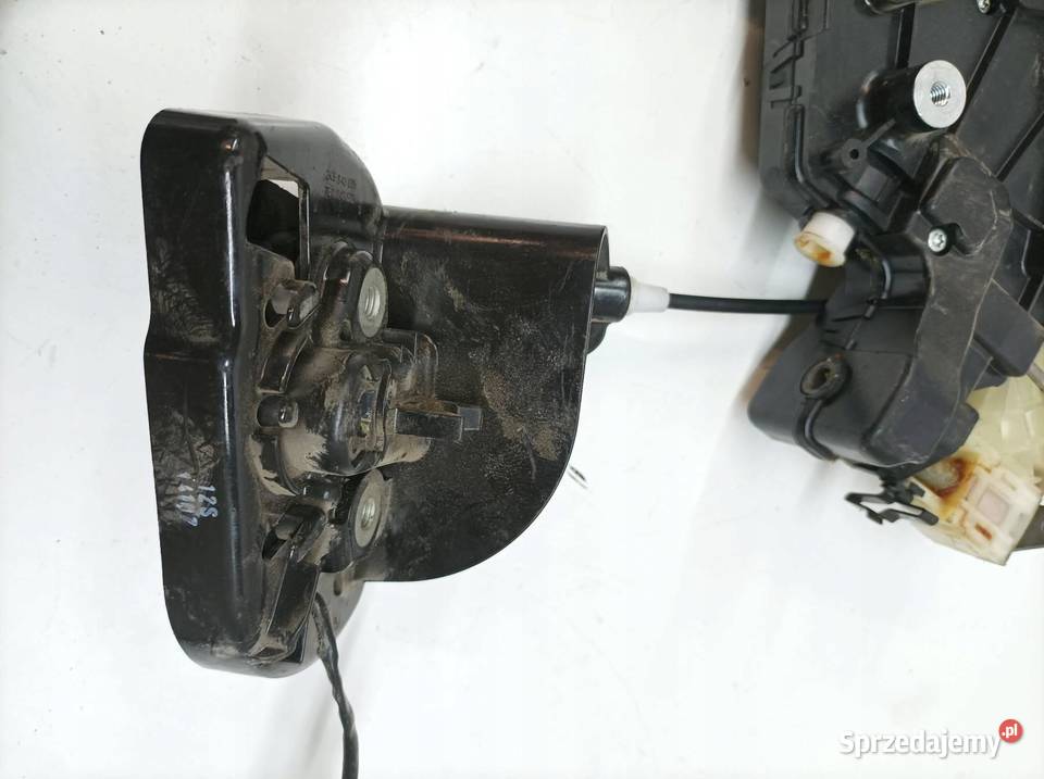 ZAMEK DRZWI TYŁ LEWY PRZESUWNY 2K5843653D VW